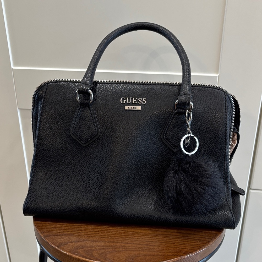 GUESS Black Pebbled Satchel with Pom Charm